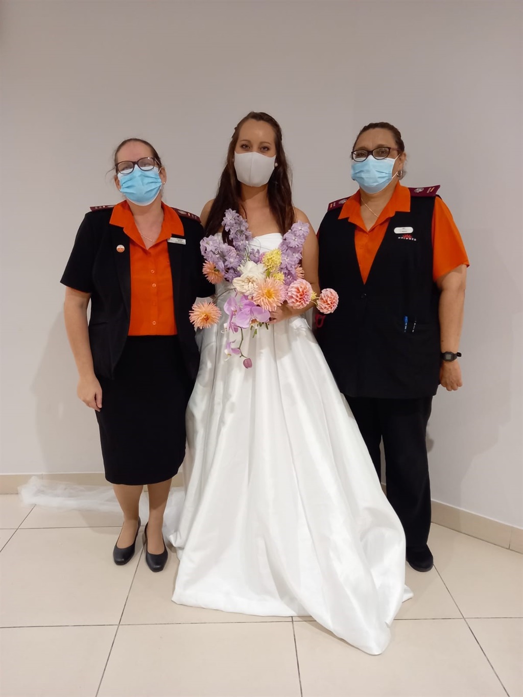 Bride poses with some of the Melomed hospital staf