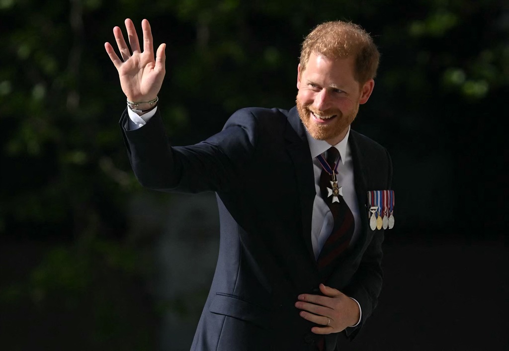 Prince Harry, Duke of Sussex waves as he arrives to attend a ceremony marking the 10th anniversary of the Invictus Games, at St Paul's Cathedral. (Justin Tallis/AFP)
