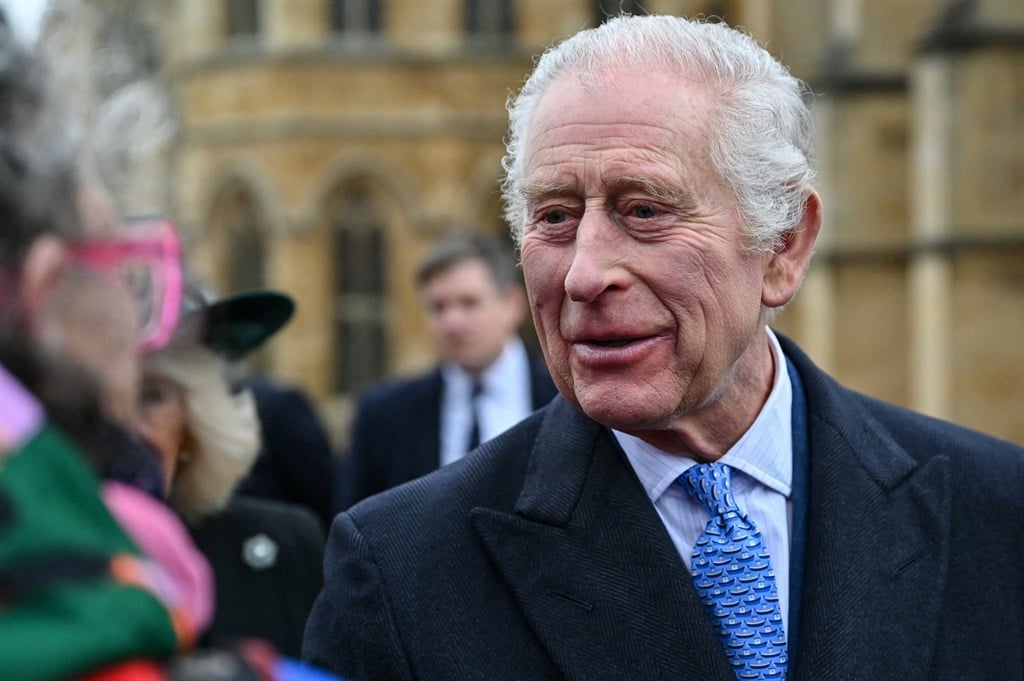 Britain's King Charles III greets well-wishers as he leaves St. George's Chapel, in Windsor Castle, after attending the Easter Mattins Service, on 31 March 2024. (Justin Tallis /AFP)