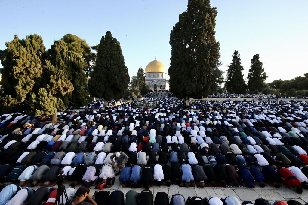 Palestinians perform Eid al-Fitr prayer at Masjid al-Aqsa Compound in East Jerusalem.