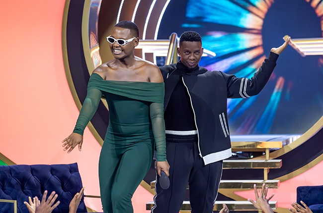 Chuene ‘Chuenzaaa’ Kapu and Big Brother host Lawrence Maleka on stage