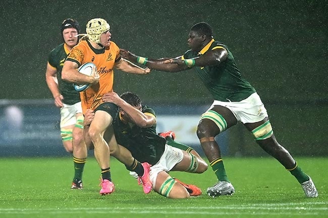 Australian winger Angus Staniforth is tackled during the U20 Rugby Championship match against South Africa at Sunshine Coast Stadium on 7 May 2024. (Albert Perez/Getty Images)