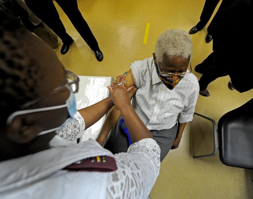 An elderly person gets vaccinated in Krugersdorp on day one of Phase 2 of SA's inoculation programme. Photo: Tebogo Letsie/City Press