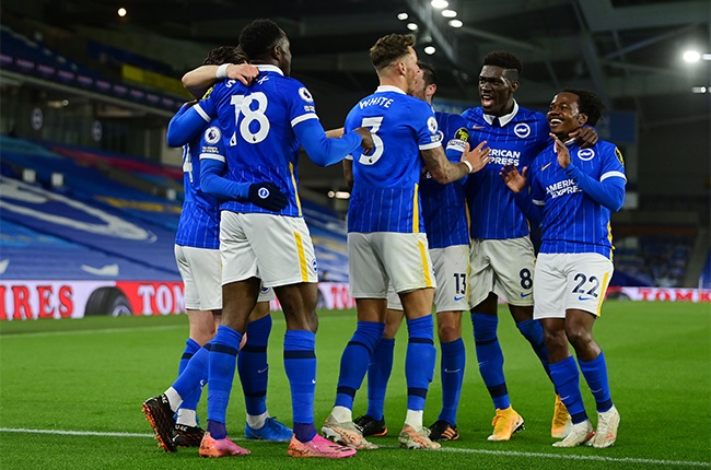 Danny Welbeck of Brighton celebrates with Percy Tau after scoring.  (Photo by Mike Hewitt/Getty Images)