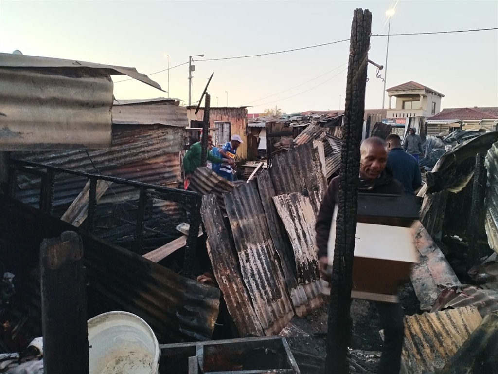 Residents from KTC area in Nyanga woke up to flames that ate their shacks on Tuesday, 27 February. Photo by Lulekwa Mbadamane