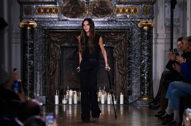 Victoria Beckham was stylish at the launch, even on crutches. (PHOTO: Gallo Images/Getty Images)