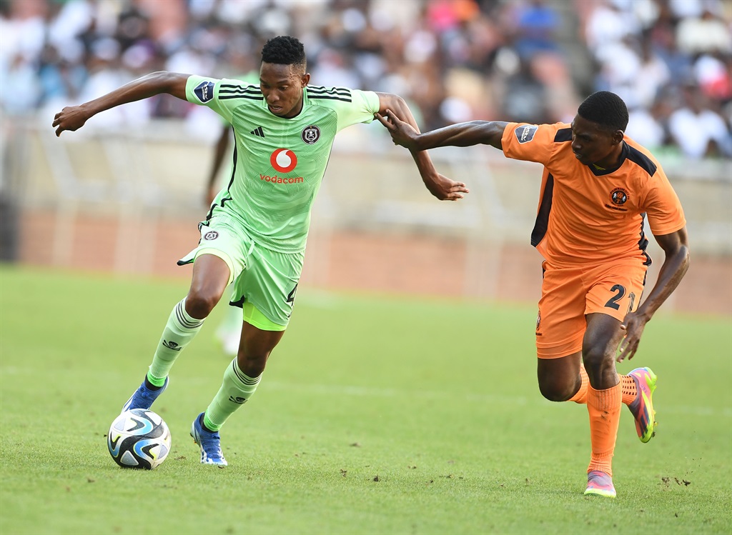 POLOKWANE, SOUTH AFRICA - MARCH 02: Mbatha Thalente of Orlando Pirates and Manuel Kambala of Polokwane City during the DStv Premiership match between Polokwane City and Orlando Pirates at Peter Mokaba Stadium on March 02, 2024 in Polokwane, South Africa. (Photo by Philip Maeta/Gallo Images)