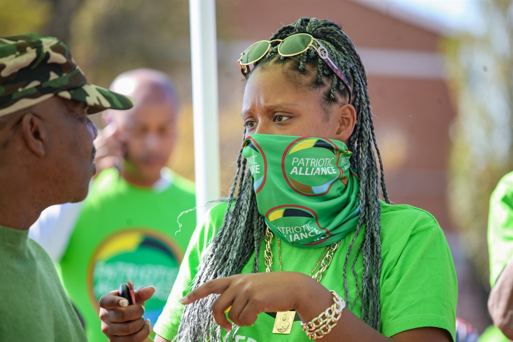 Members of the Patriotic Alliance outside one of the voting stations in Eldoraldo Park. (Photo: Sharon Seretlo/Gallo Images)