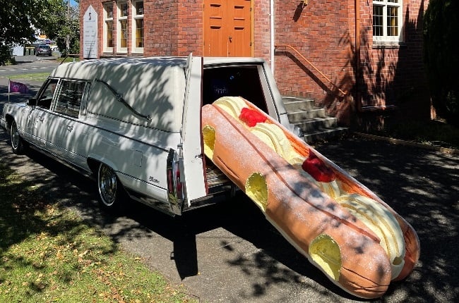 For his cousin Phil’s funeral, Ross Hall created this cream-doughnut coffin out of foam. (PHOTO: dyingart.co.nz) 