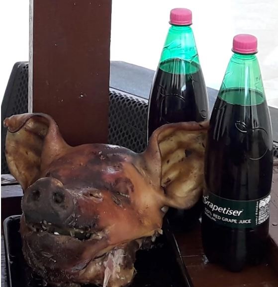 Prophet Rufus Phala served a pig skop in his church during a Holy Communion service on Sunday. Photo: Supplied.
