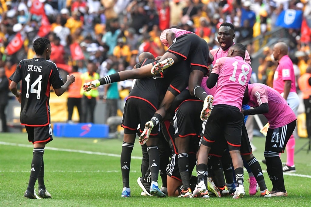 JOHANNESBURG, SOUTH AFRICA - MARCH 09:  Thabiso Lebitso of Orlando Pirates celebrates his goal with his teammates during the DStv Premiership match between Orlando Pirates and Kaizer Chiefs at FNB Stadium on March 09, 2024 in Johannesburg, South Africa. (Photo by Sydney Seshibedi/Gallo Images)