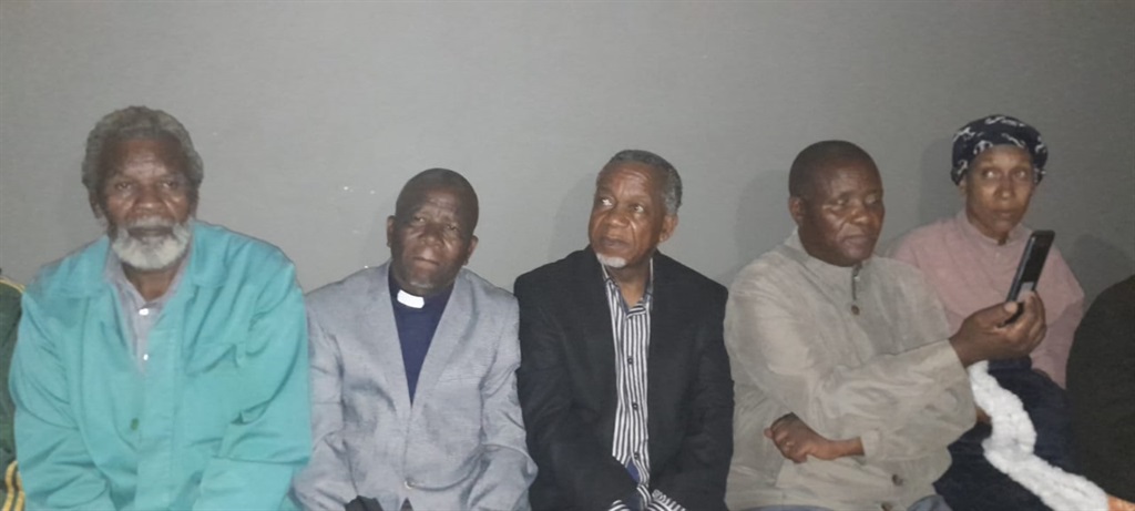 ACDP leader Reverend Kenneth Meshoe (in a black jacket) was one of the pastors who offered support to members of the Vision of God Church in Zion. Photo by Happy Mnguni