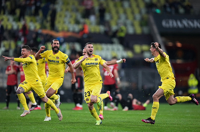 Villarreal's midfielder Moises and team-mates celebrating (AFP)