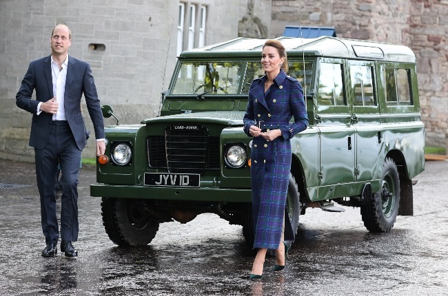 The Duke and Duchess of Cambridge arrive in Philip's Land Rover at the Palace of Holyroodhouse in Edinburgh during their royal tour of Scotland. (PHOTO: Gallo Images/Getty Images)