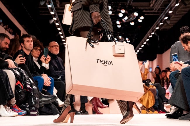 A model, bag and shoe detail, walks the runway during the Fendi fashion show as part of Milan Fashion Week Fall/Winter 2020-2021 on February 20, 2020 in Milan, Italy. (Photo by Pietro D'Aprano/Getty Images)