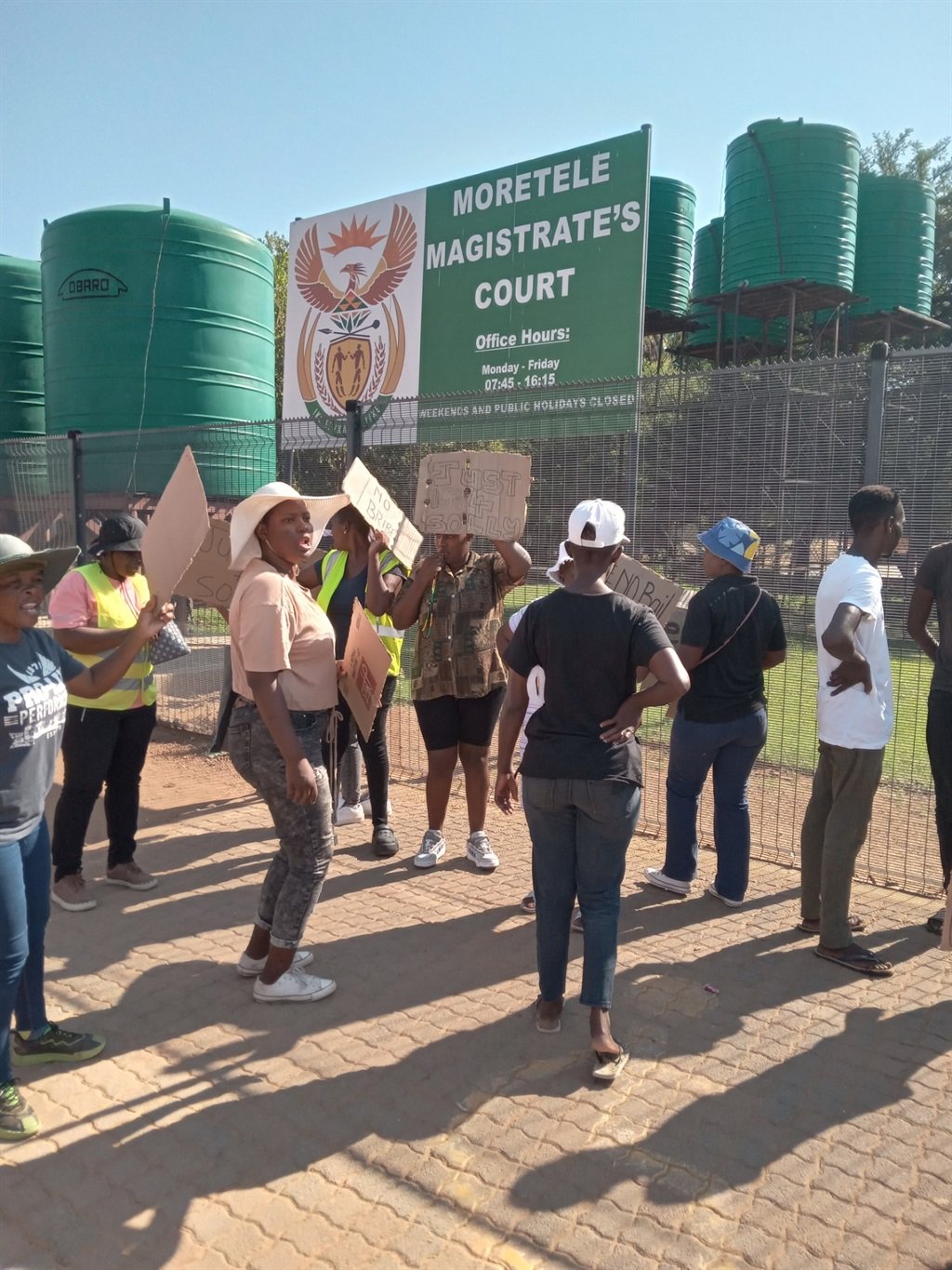 Residents from Dertig in Hammanskraal demonstrating outside court for suspects not to get bail. Photo by Thokozile Mnguni