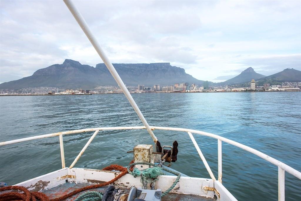 A view of table mountain and the city of Cape Town from the bow of a Fishing Trawler in Table Bay. (JFJacobsz/ Getty Images)
