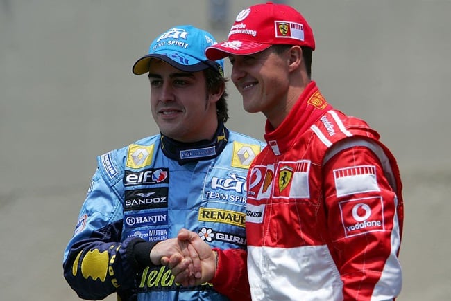 Michael Schumacher of Germany and Ferrari shakes hand with title contender Fernando Alonso prior to the Brazilian Formula One Grand Prix at the Autodromo Interlagos on October 22, 2006 in Sao Paulo, Brazil.