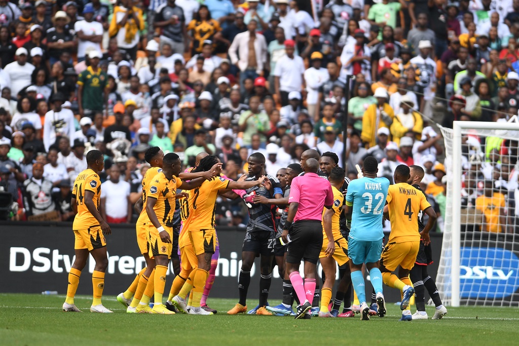 Kaizer Chiefs and Orlando Pirates players and fans during their DStv Premiership Soweto Derby at the FNB Stadium on 11 November 2023 in Johannesburg, South Africa. 