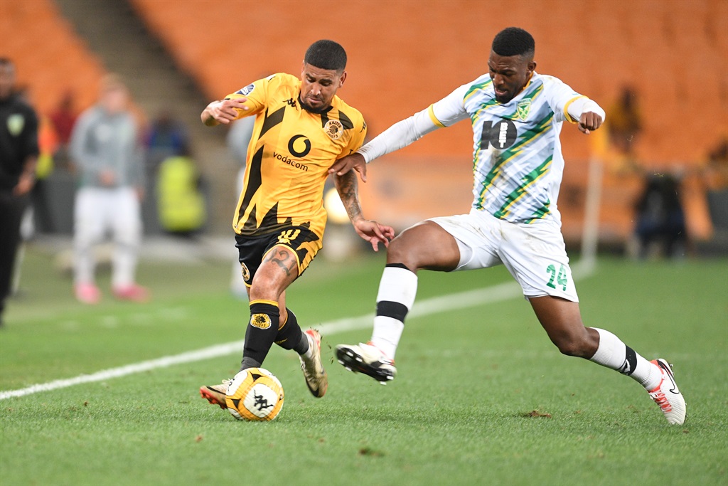 JOHANNESBURG, SOUTH AFRICA - MARCH 05: Keagan Dolly of Kaizer Chiefs and Nqobeko Siphelele Dlamini of Golden Arrows during the DStv Premiership match between Kaizer Chiefs and Golden Arrows at FNB Stadium on March 05, 2024 in Johannesburg, South Africa. (Photo by Lefty Shivambu/Gallo Images)