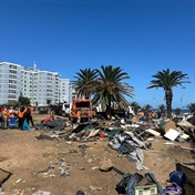 'Open your eyes and look around you, trash': Deputy human settlements minister swipes at Western Cape