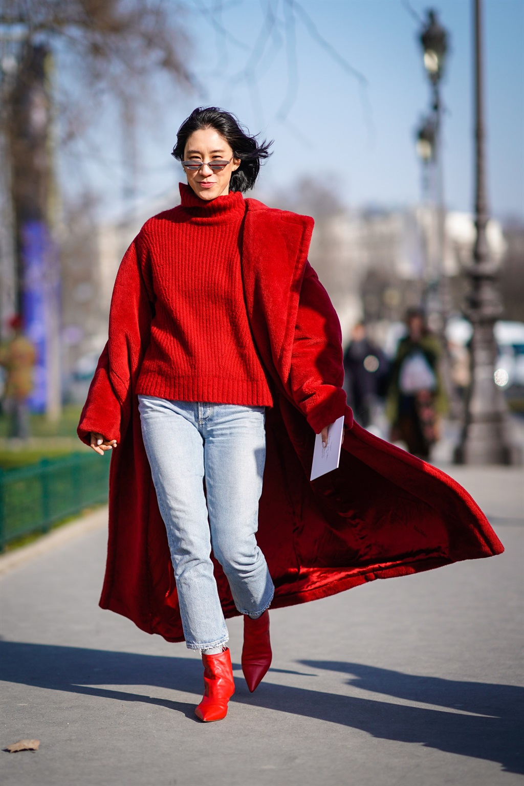 PARIS, FRANCE - FEBRUARY 28: Eva Chen wears a red