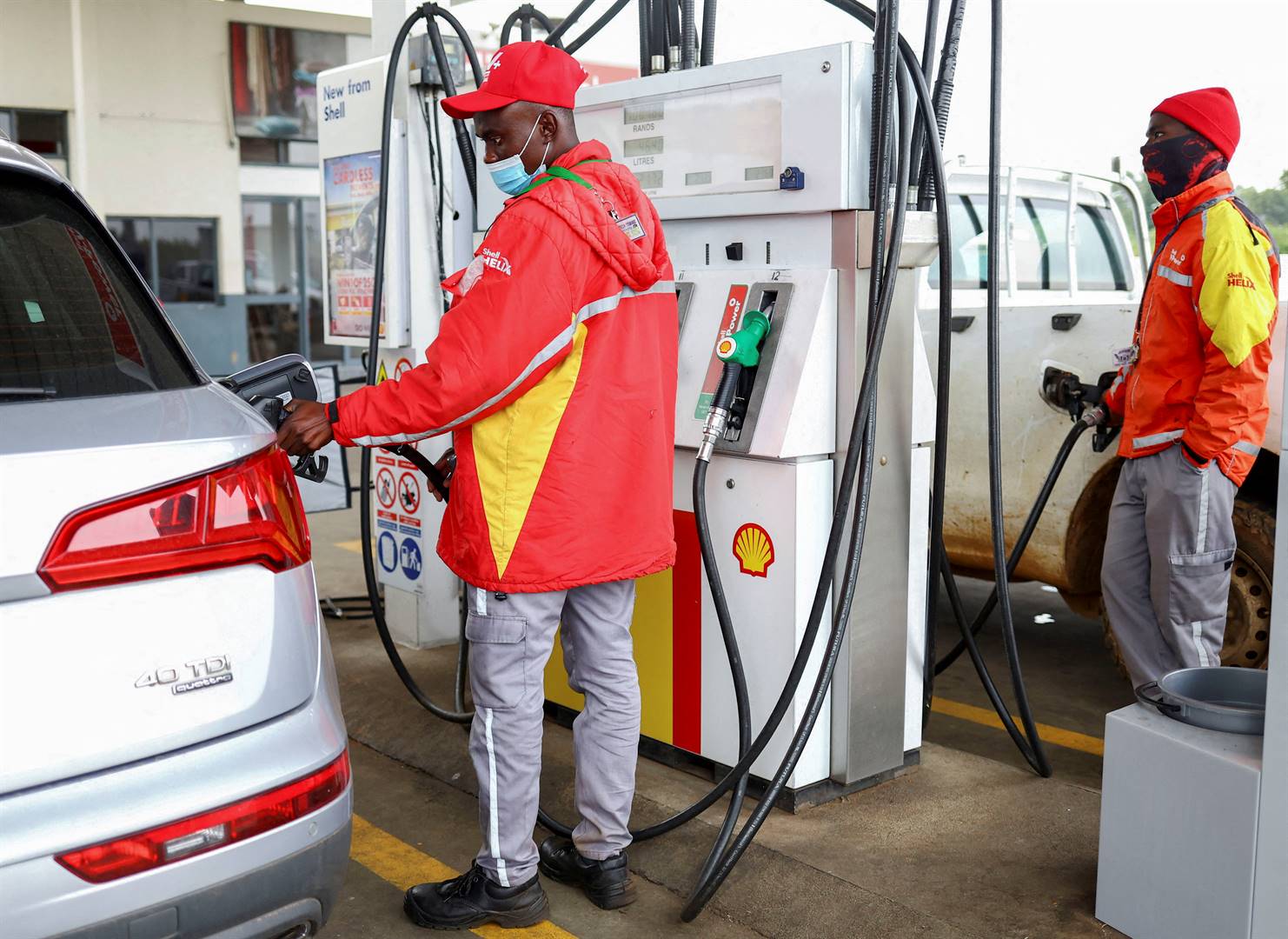 Workers at a Shell filling station in Johannesburg
