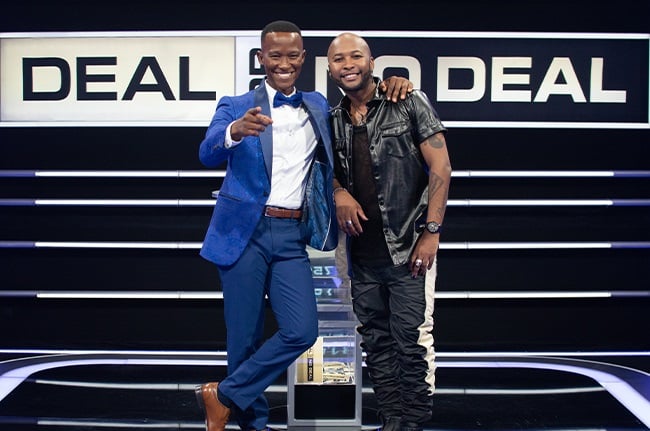 Deal or No Deal SA Celebrity host Katlego Maboe with Vusi Nova. 