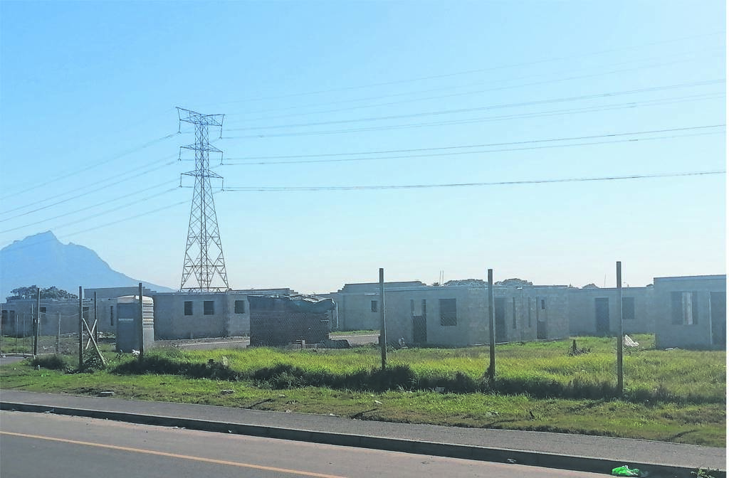 Housing construction at the erf 8448 project along Govan Mbeki Road in Gugulethu, Cape Town.