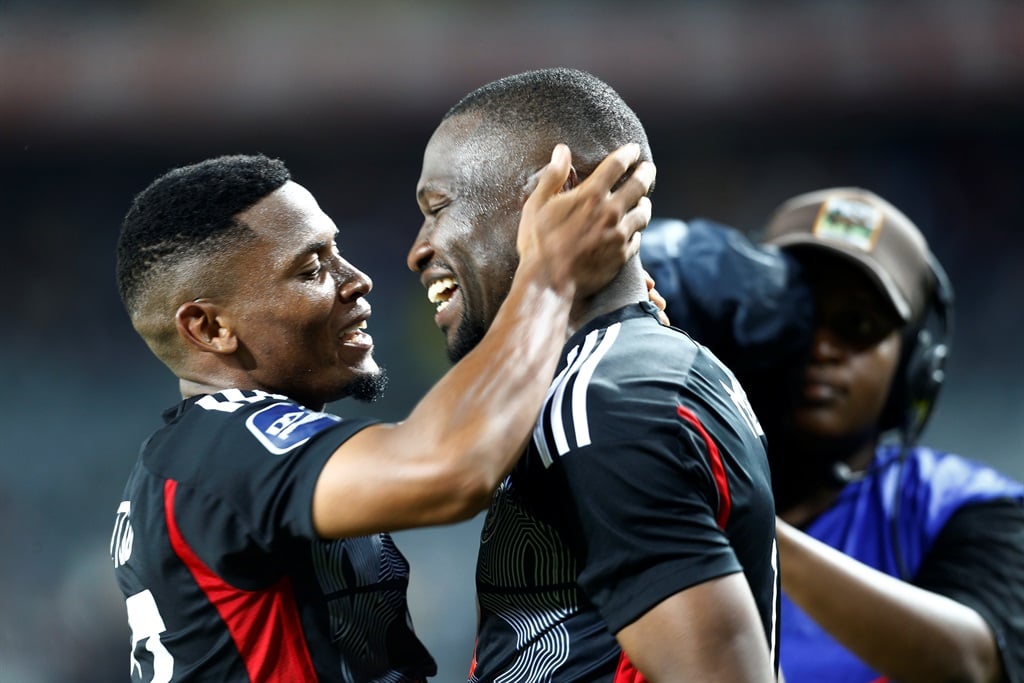 Tshegofatso Mabasa of Orlando Pirates celebrates his goal with Thabiso Lebitso during the DStv Premiership match between Orlando Pirates and Golden Arrows at Orlando Stadium on 6 April 2024 in Johannesburg, South Africa. 