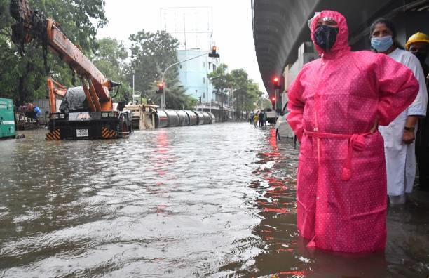 Mumbai Mayor Kishori Pednekar inspects the waterlogged area during the heavy rains at Hindmata, Parel, on June 9, 2021 in Mumbai, India. (Photo by Bhushan Koyande/Hindustan Times via Getty Images)
