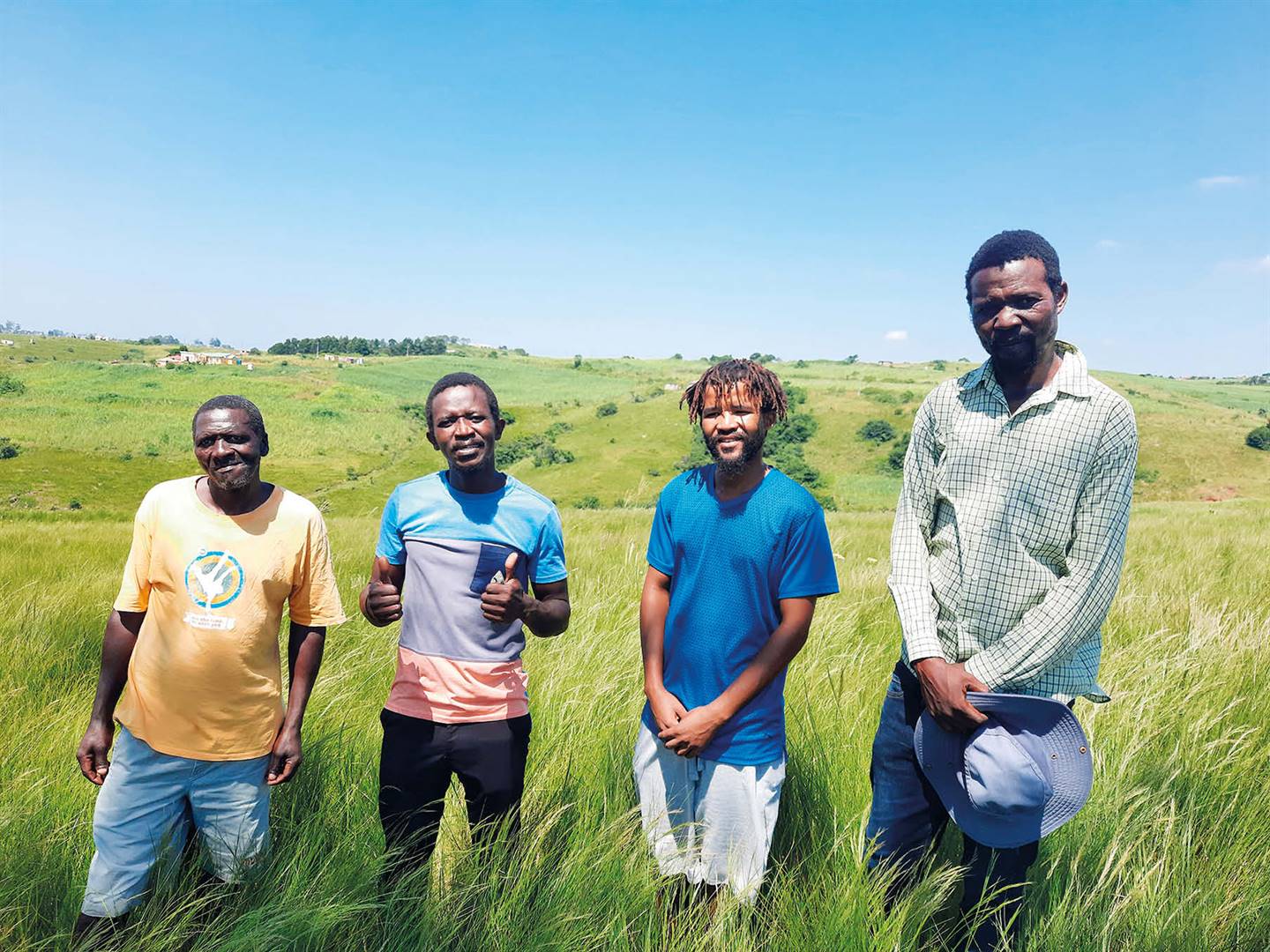 Die Elangeni-­groensoneboere is, van links, Jabulani Khuzwayo, Mthokozisi Mathonsi, Marcel Greeff en Sizwe Mbatha.