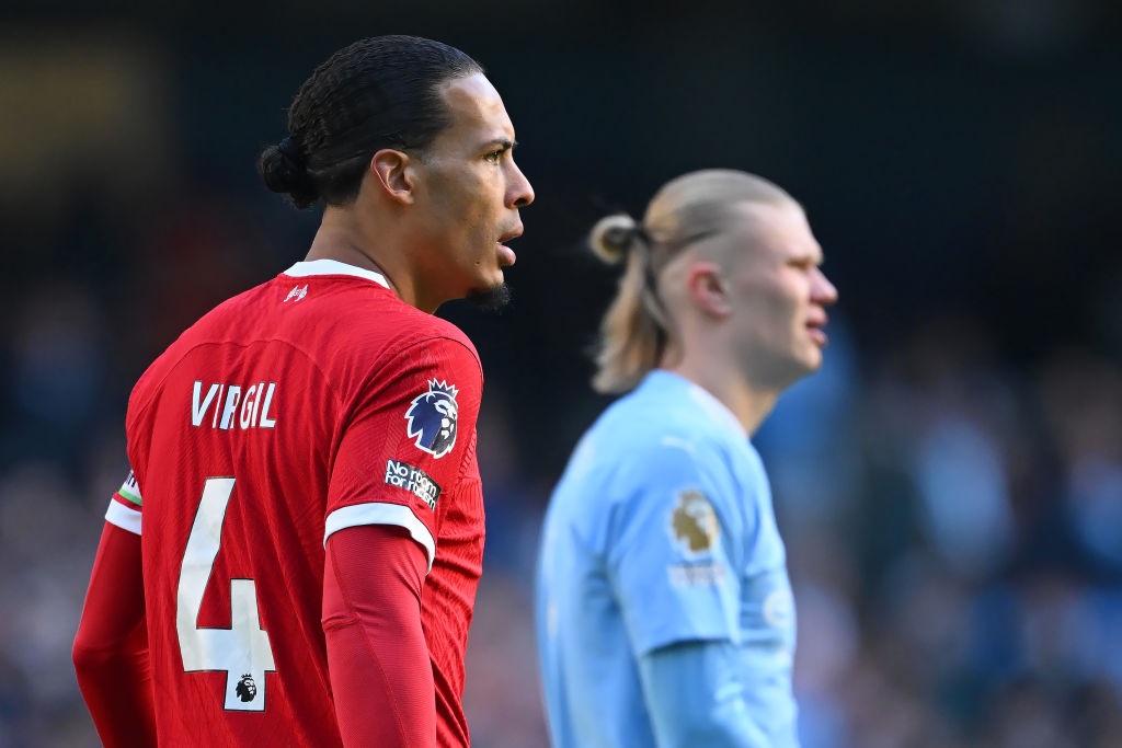 MANCHESTER, ENGLAND - NOVEMBER 25: Virgil van Dijk of Liverpool looks on with Erling Haaland of Manchester City during the Premier League match between Manchester City and Liverpool FC at Etihad Stadium on November 25, 2023 in Manchester, England. (Photo by Michael Regan/Getty Images)