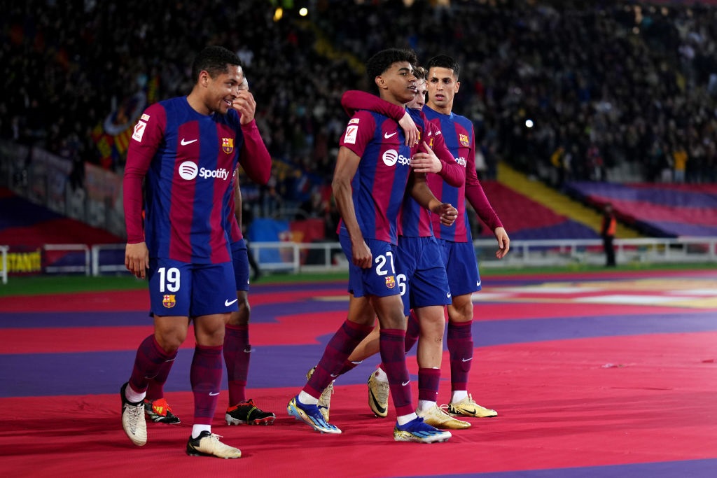 BARCELONA, SPAIN - MARCH 08: Lamine Yamal of FC Barcelona celebrates scoring his teams first goal with teammates during the LaLiga EA Sports match between FC Barcelona and RCD Mallorca at Estadi Olimpic Lluis Companys on March 08, 2024 in Barcelona, Spain. (Photo by Alex Caparros/Getty Images)