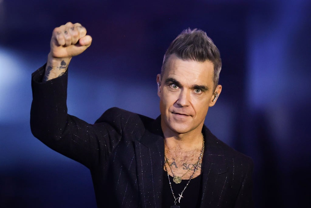 Robbie Williams performs on stage during the Wetten, dass...? Live Show on 19 November 2022 in Friedrichshafen, Germany. (Andreas Rentz/Getty Images)