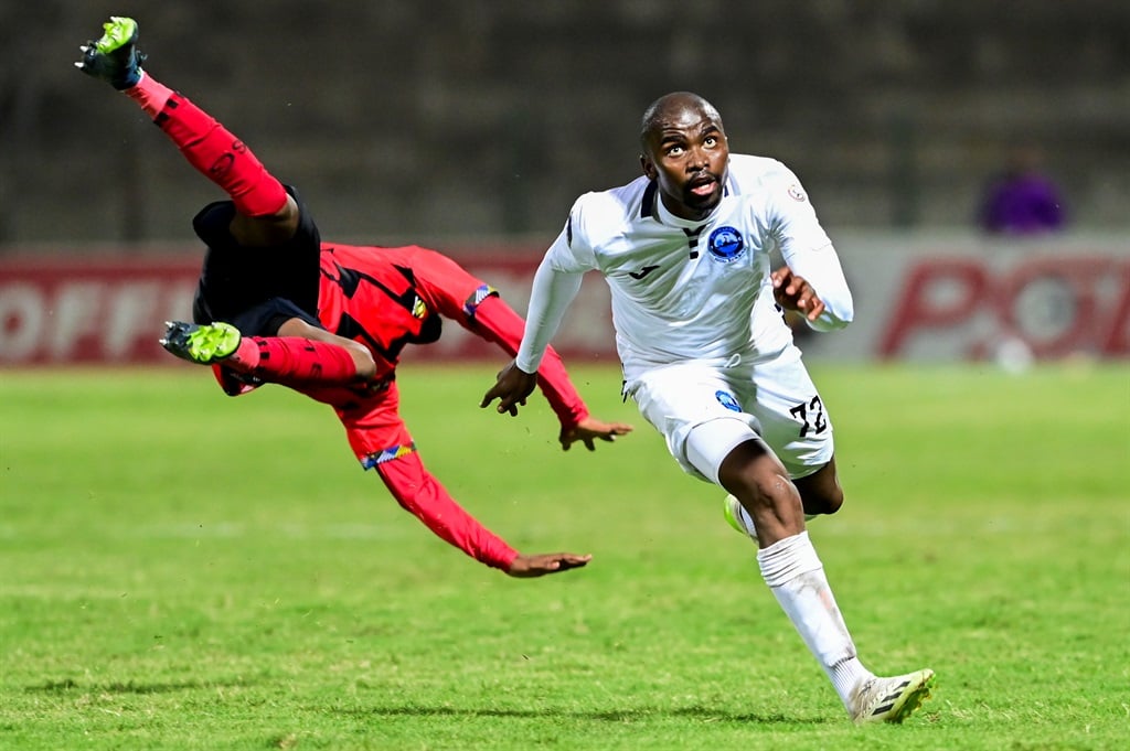 DURBAN, SOUTH AFRICA - MARCH 09: Tshepo Mabua of Richards Bay and Kamogelo Sebelebele of TS Galaxy FC during the DStv Premiership match between Richards Bay and TS Galaxy at King Goodwill Zwelithini Stadium on March 09, 2024 in Durban, South Africa. (Photo by Darren Stewart/Gallo Images