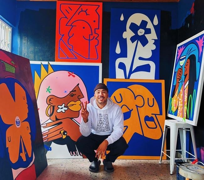 Russel Abrahams with some of his paintings. (Yay Abe /Instagram)