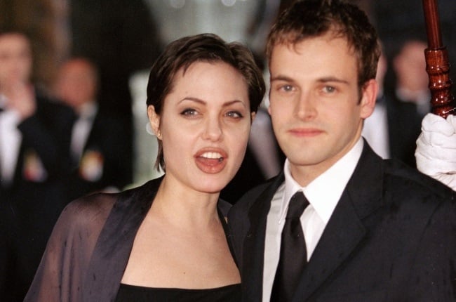 Former spouses Angelina Jolie and Jonny Lee Miller at the Baftas in 1998 in London. (PHOTO: Gallo Images/Getty Images)