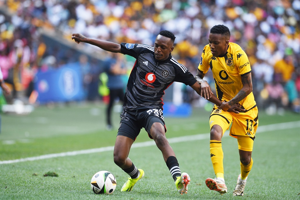 Patrick Maswanganyi of Orlando Pirates and Pule Mmodi of Kaizer Chiefs during the DStv Premiership match between Orlando Pirates and Kaizer Chiefs at the FNB Stadium on 9 March 2024 in Johannesburg, South Africa. 