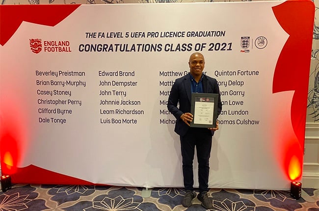 Former Bafana Bafana and Manchester United player Quinton Fortune displaying his UEFA Pro Licence certificate.