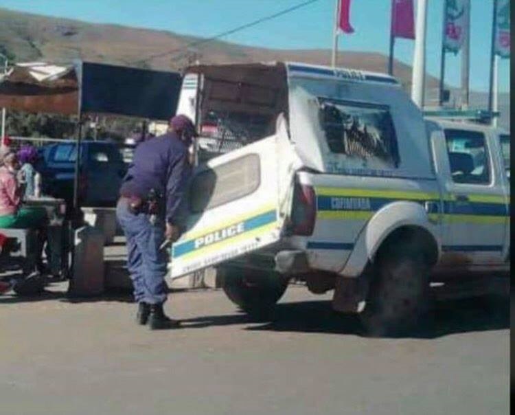 Eastern Cape police apparently drove around in a van dragging a broken rear door.