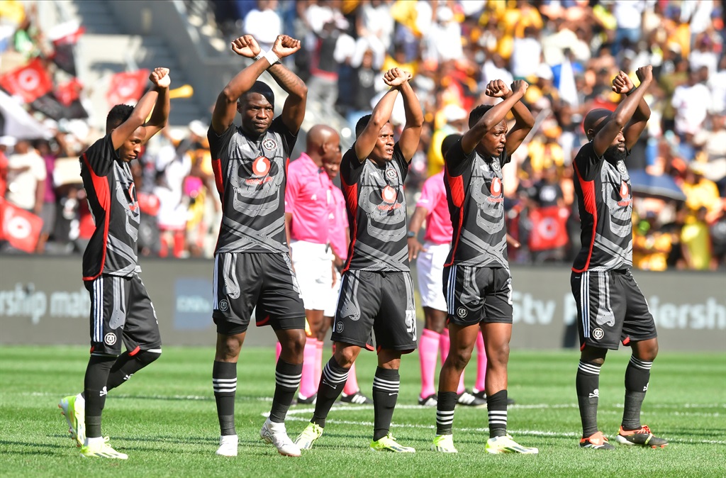 Teams take the field during the DStv Premiership match between Orlando Pirates and Kaizer Chiefs at FNB Stadium on March 09, 2024 in Johannesburg, South Africa. 