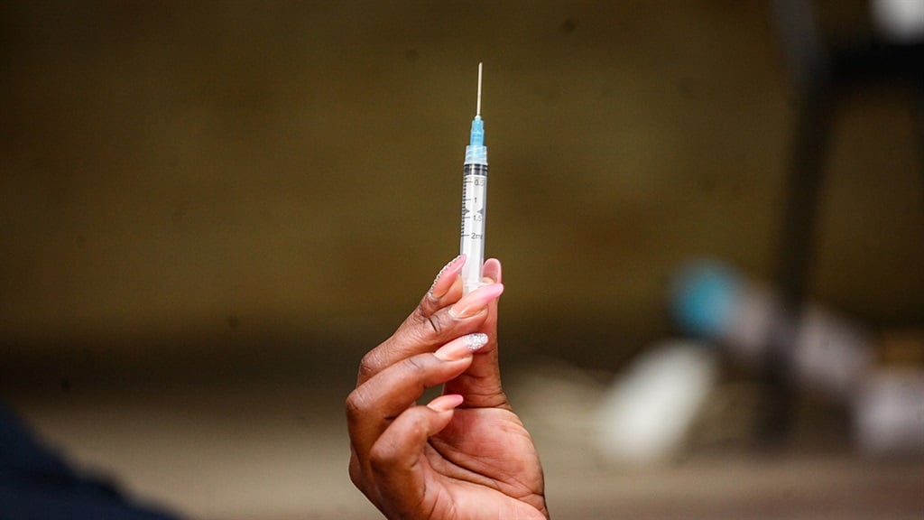 Surgeon General Vivek Murthy refuted criticism that the US's booster programme ran counter to helping vaccinate the rest of the world. (Photo by Sharon Seretlo/Gallo Images via Getty Images)
