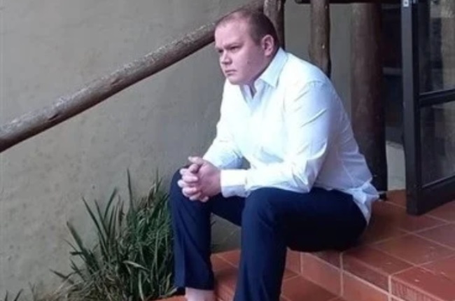 George Vorster on the steps of the wedding venue. He’d almost finished dressing for the ceremony when he was arrested. (Photo: Supplied)