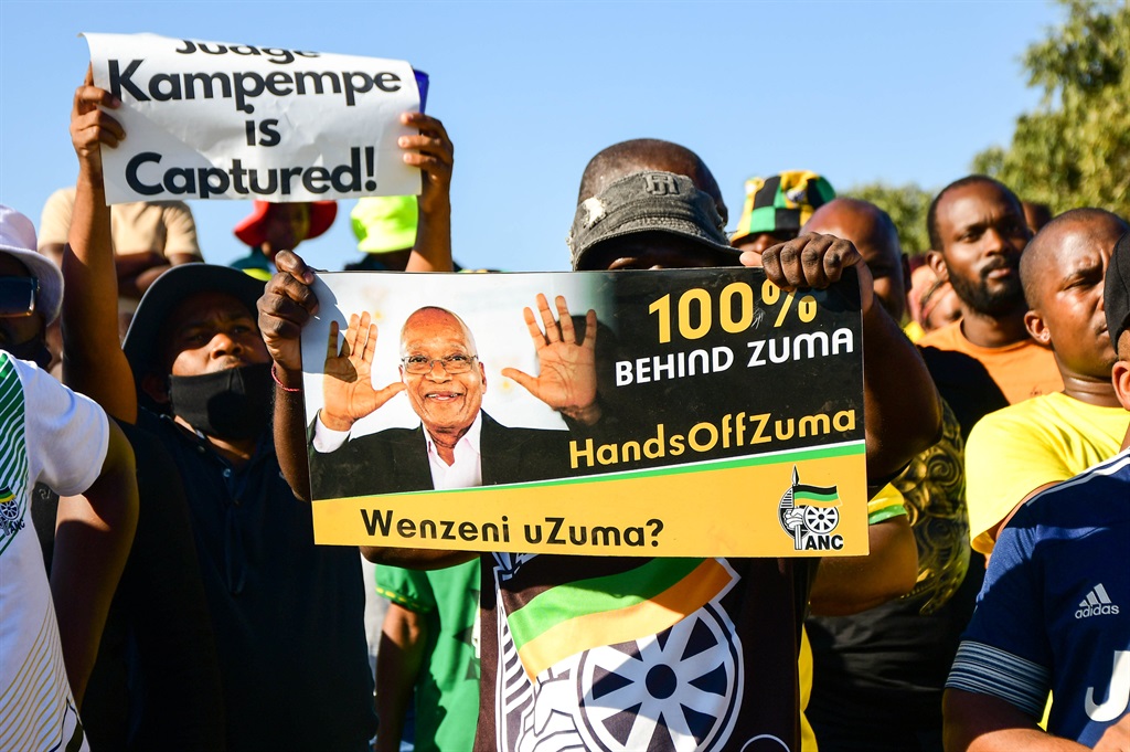 A group of Jacob Zuma supporters at his homestead on July 1 in Nklanda. Photo by Gallo Images/Darren Stewart