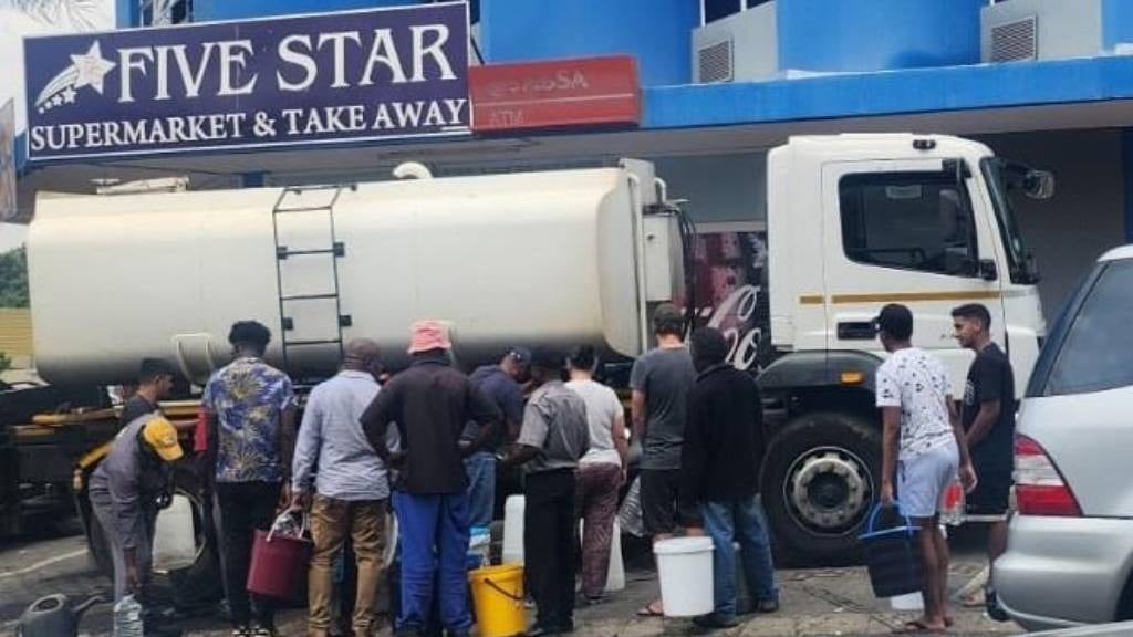 Randburg residents are refilling water from provided tankers after days without water.  (Belinda Feto/News24)