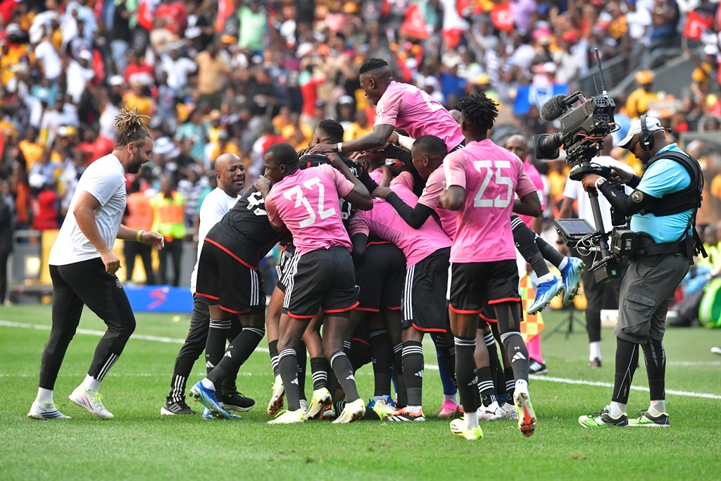 JOHANNESBURG, SOUTH AFRICA - MARCH 09:  Thabiso Lebitso of Orlando Pirates celebrates his goal with his teammates during the DStv Premiership match between Orlando Pirates and Kaizer Chiefs at FNB Stadium on March 09, 2024 in Johannesburg, South Africa. (Photo by Sydney Seshibedi/Gallo Images)