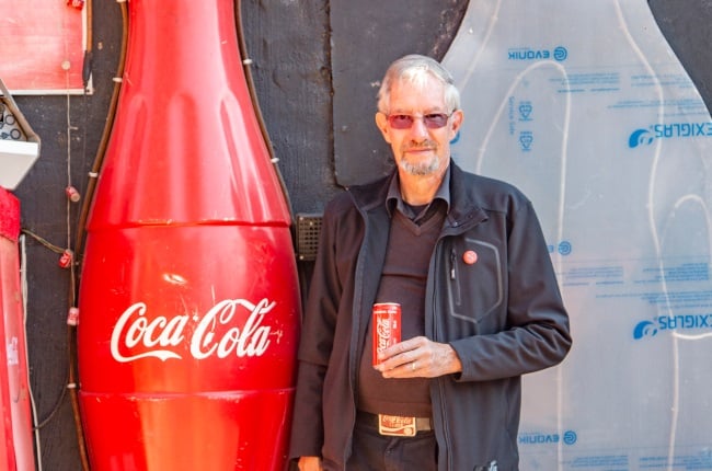 Hendrik Botha has an impressive collection of Coke memorabilia. (PHOTO: Onkgopotse Koloti)