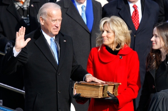 Joe Biden being sworn in as vice president in 2009, as his wife Jill holds up a Bible during the inauguration ceremony. (PHOTO: Gallo Images / Getty Images)