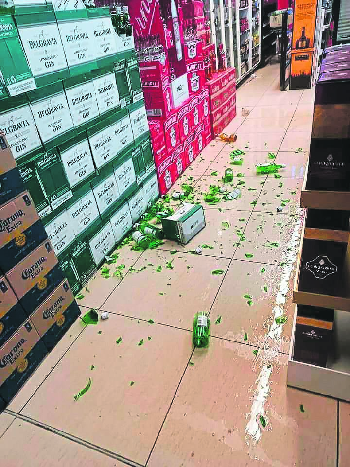 The damage the thieves left inside the liquor store.